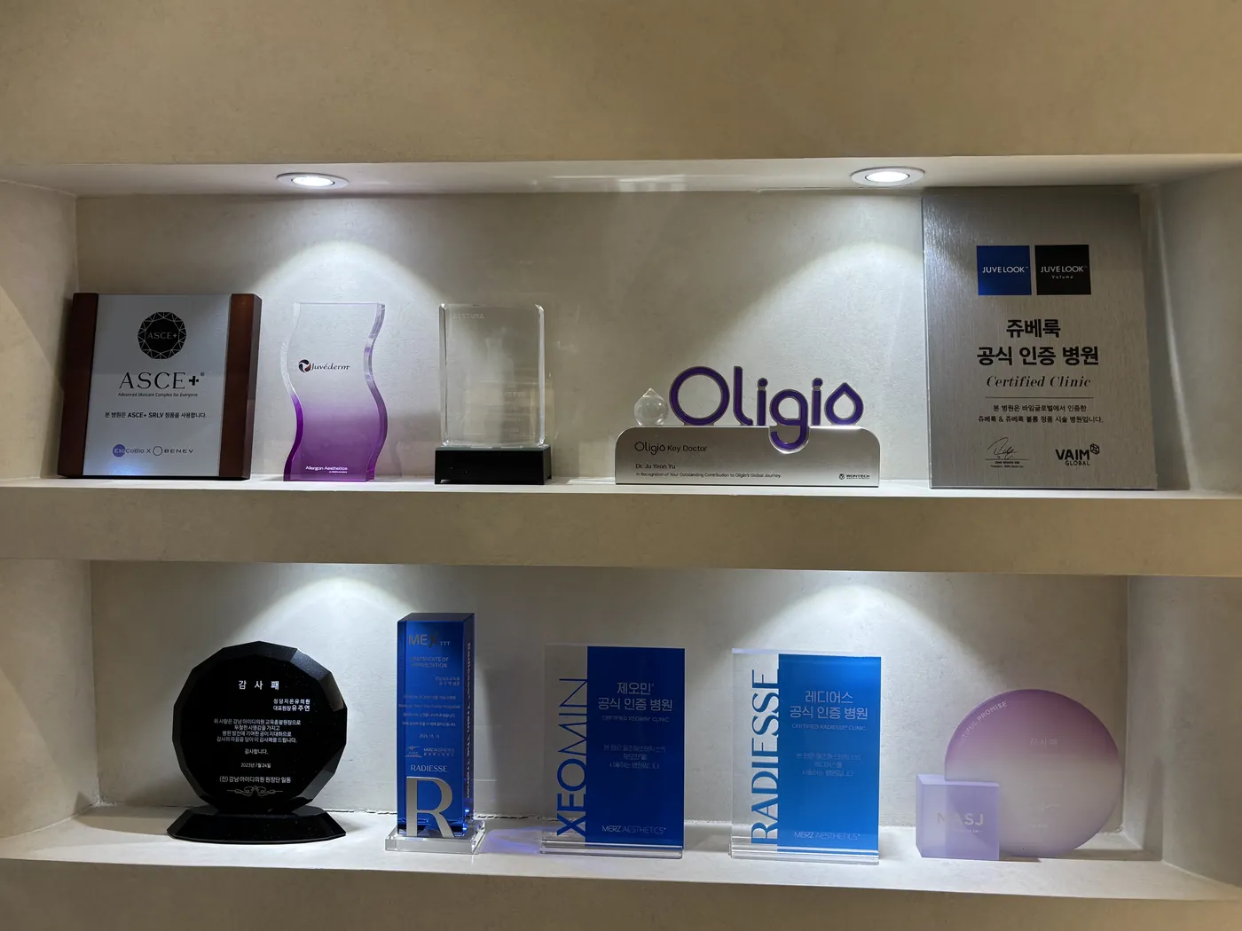 Certifications and awards on display in the clinic
